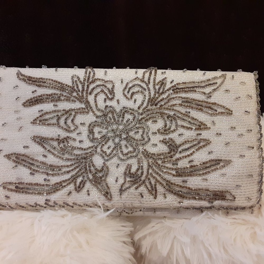 La Regale Silver Beaded clutch bag
